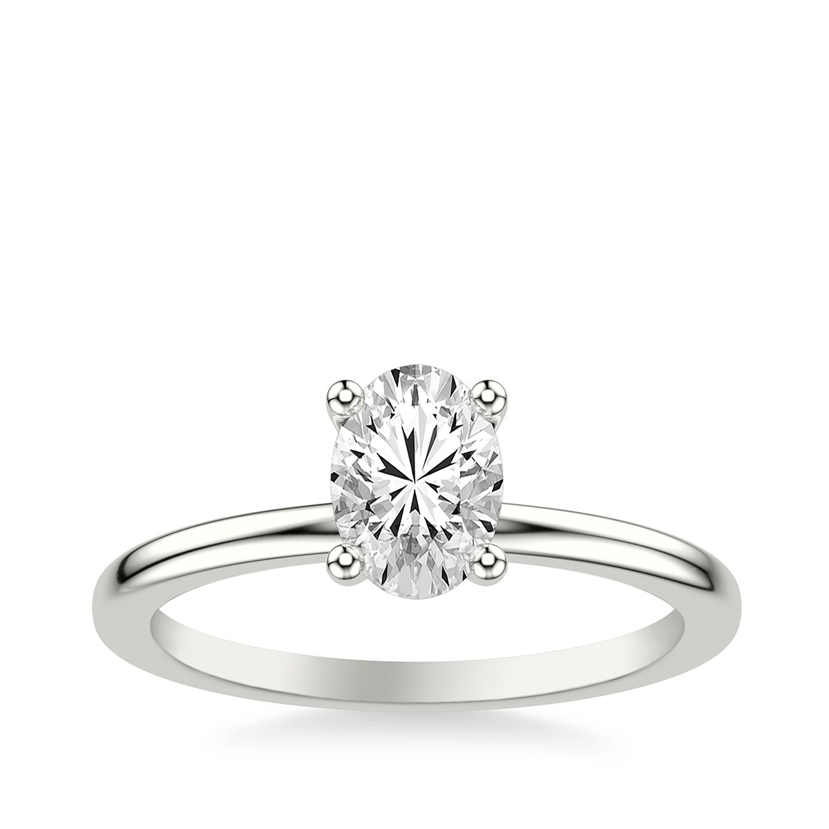 White gold oval diamond & hidden halo engagement ring